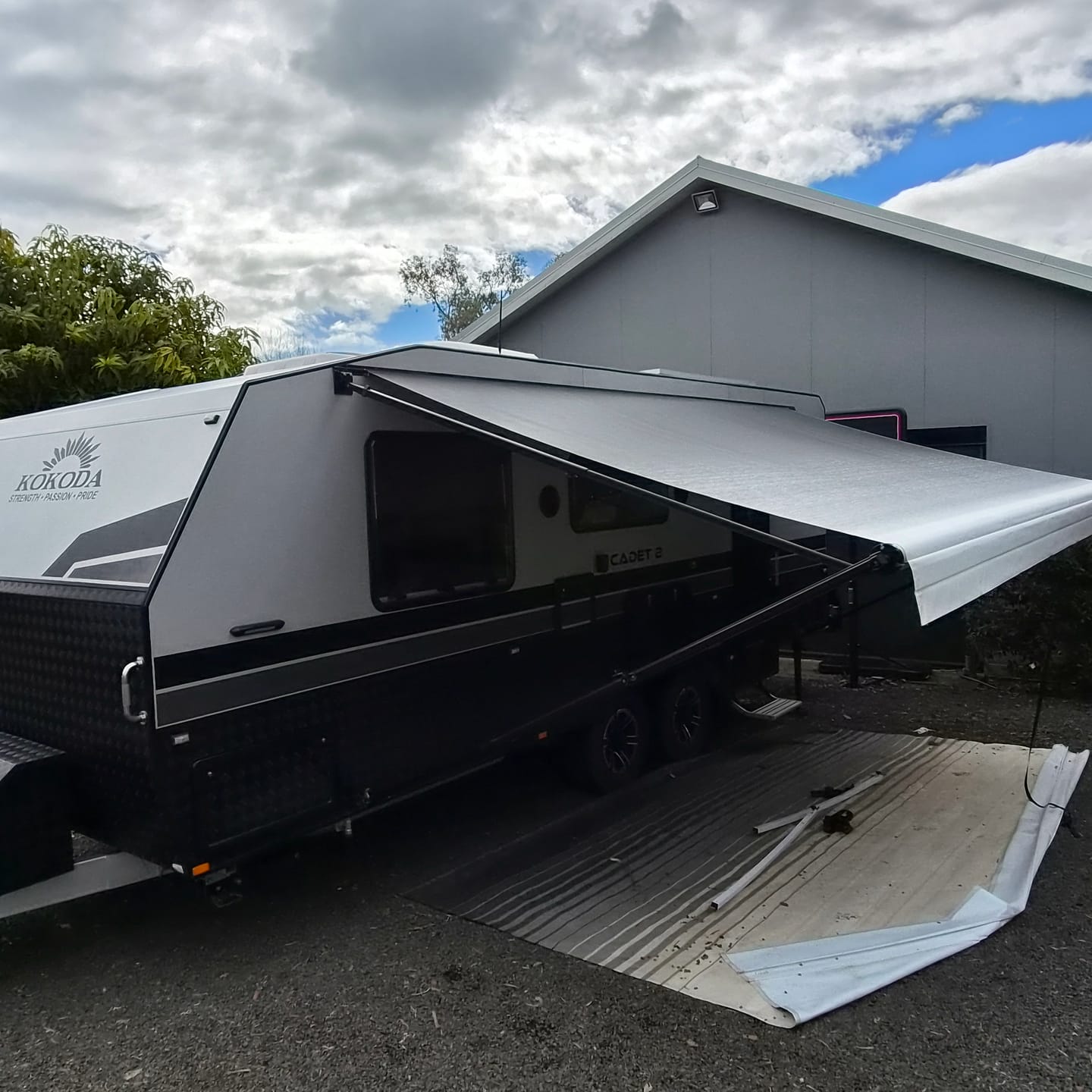 Customer photo review of Awning Replacement Vinyl - Black Fade WA1001 White Flap