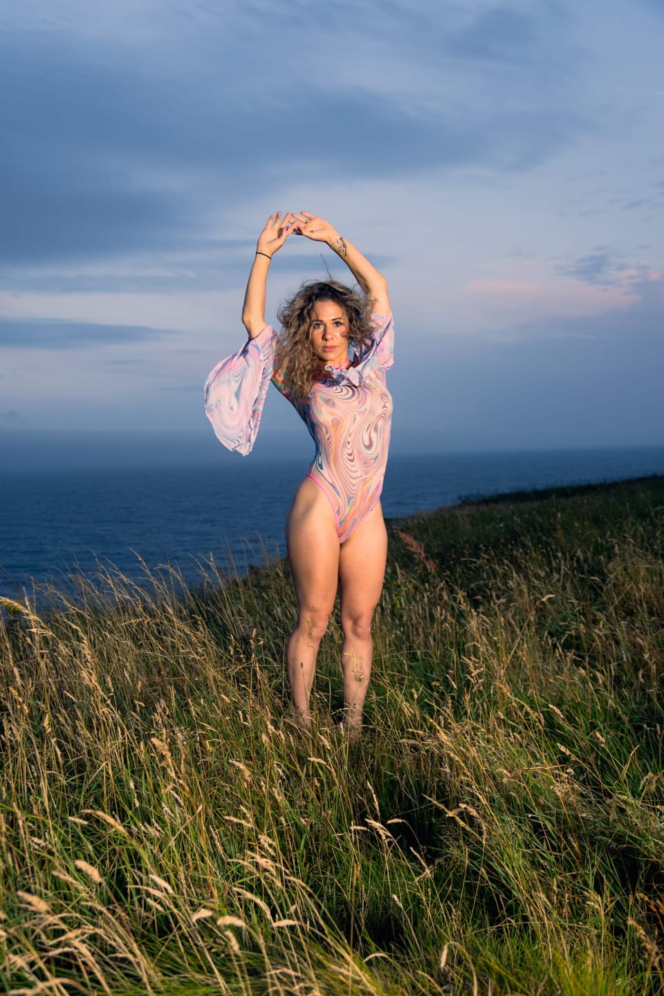 Customer photo review of Endless Hypnosis Sheer Bell Sleeve Bodysuit