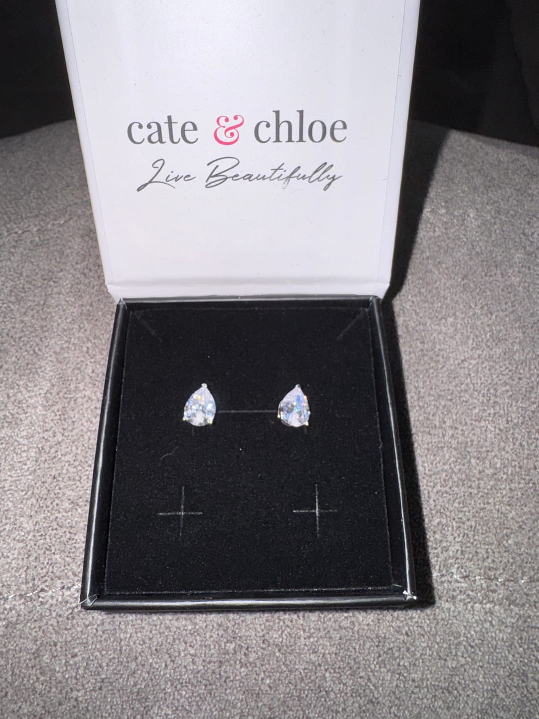 Customer photo review of Mia 18k White Gold Plated Sterling Silver Stud Earrings with Simulated Diamond Crystals