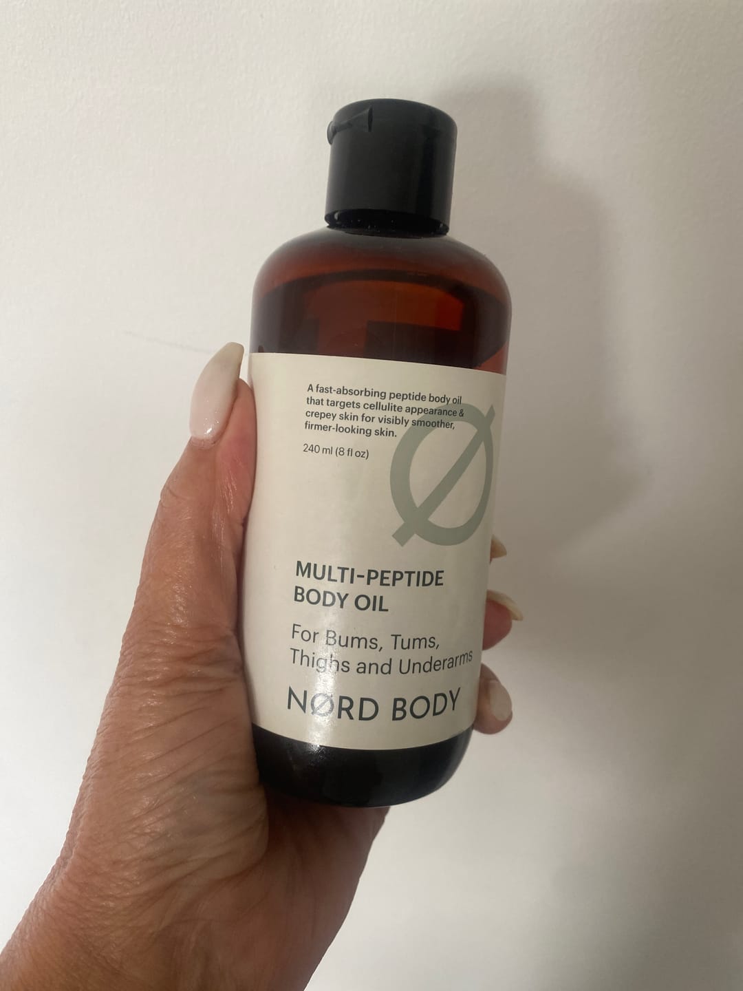Customer photo review of NØRD BODY Peptide Body Oil