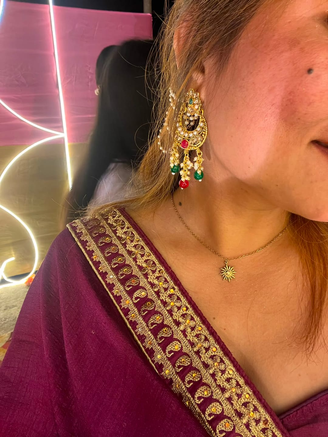 Customer photo review of Glowing Sun Necklace