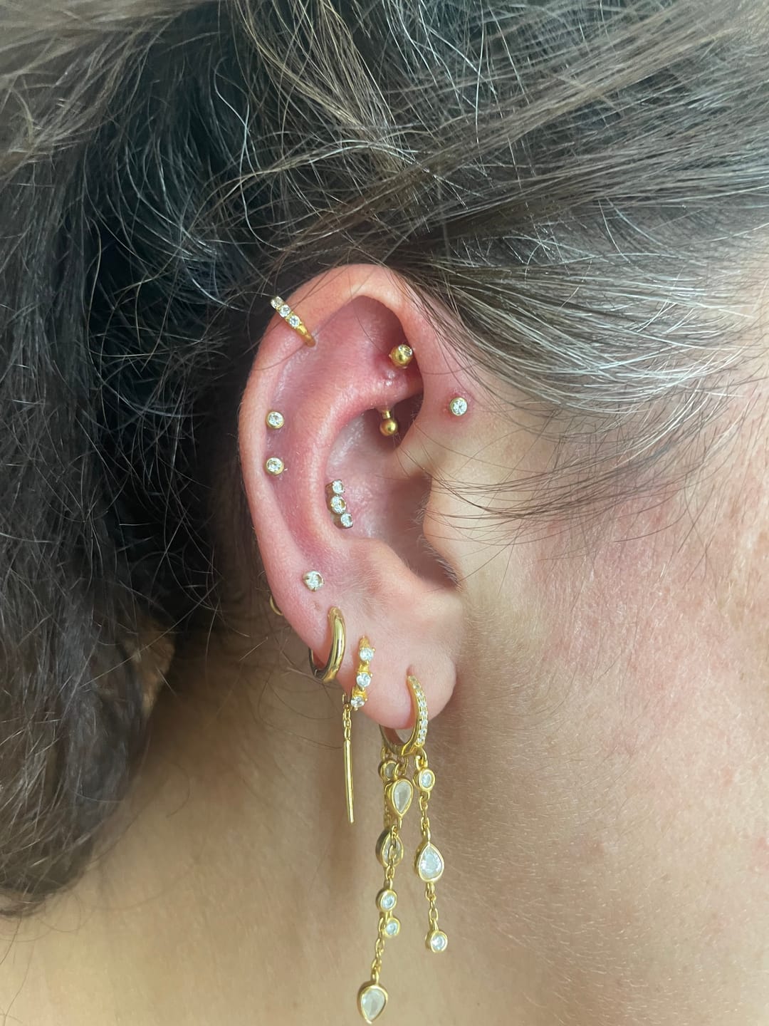 Customer photo review of ELYSIAN Waterfall Huggie Hoops