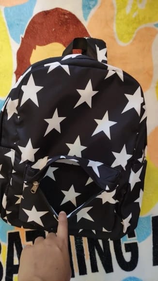 Customer photo review of Mochila Preta com Estrelas
