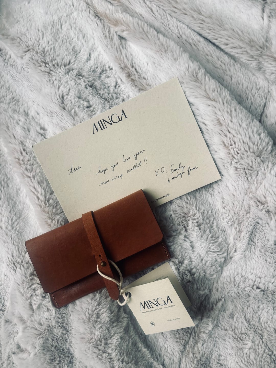 Tara W. wearing the Leather Wrap Wallet