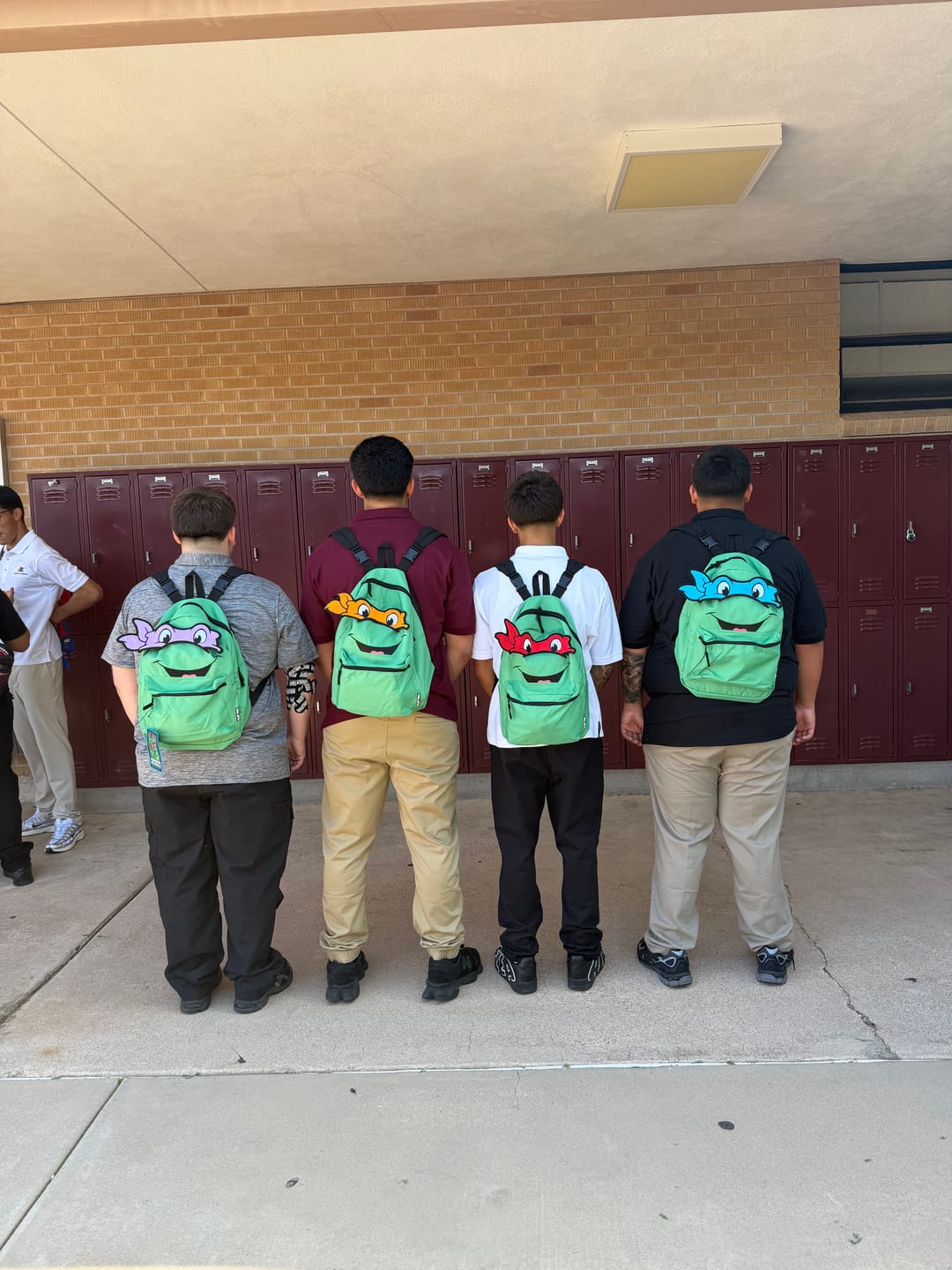 Customer photo review of Bioworld Unisex KidsTeenage Mutant Ninja Turtles Interchangeable Characters 16.5" Reversible Backpack (Little Kid/Big Kid) Aop One-Size