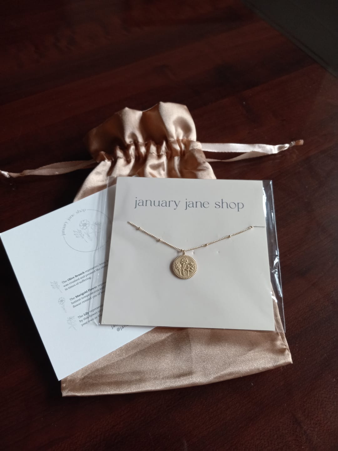 Customer photo review of Holy Family Floral Necklace - 14K Gold Filled