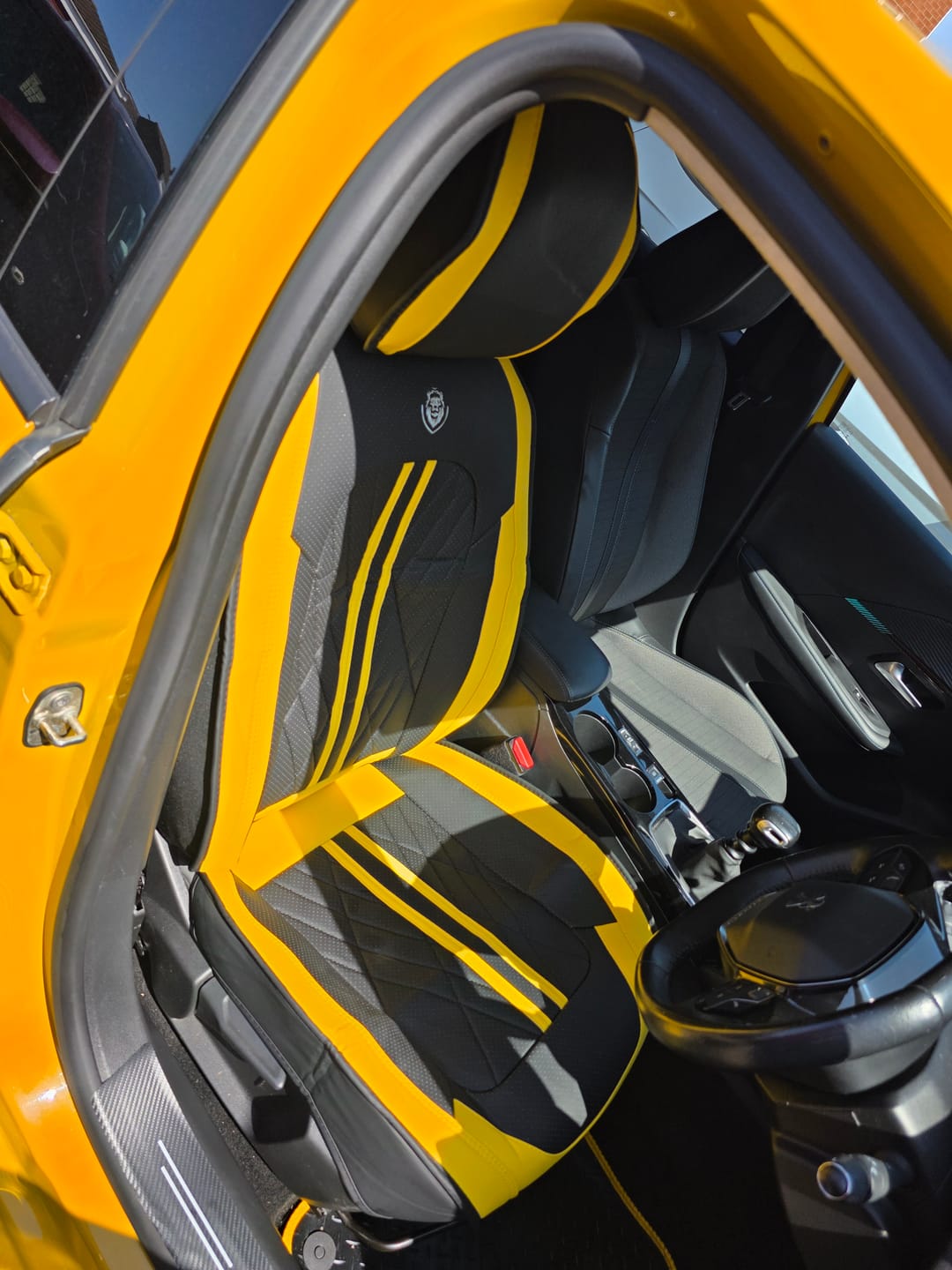 Colin W.'s car with Black & Yellow seat covers
