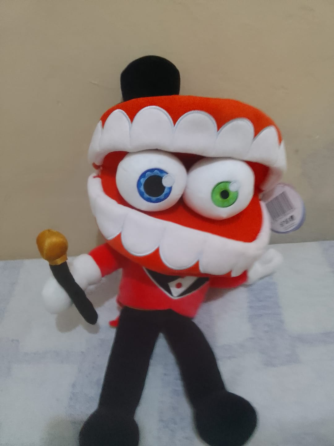 Customer photo review of Caine Puppet Plush