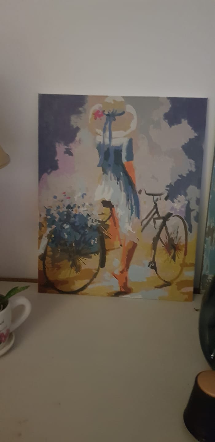 Customer photo review of Jeune femme à bicyclette