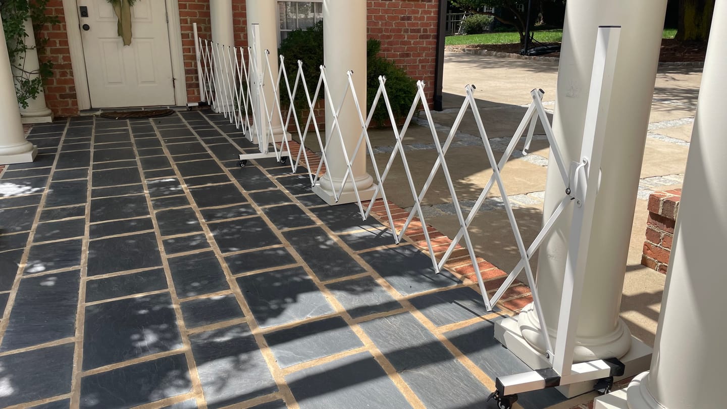 Customer photo review of Fairybaby Extra Wide Retractable Outdoor Dog Gate,Expandable Portable Fence