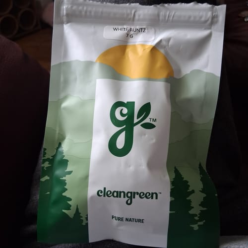 Customer's White Runtz 7g product packaging featuring a green landscape illustration with a yellow sun.