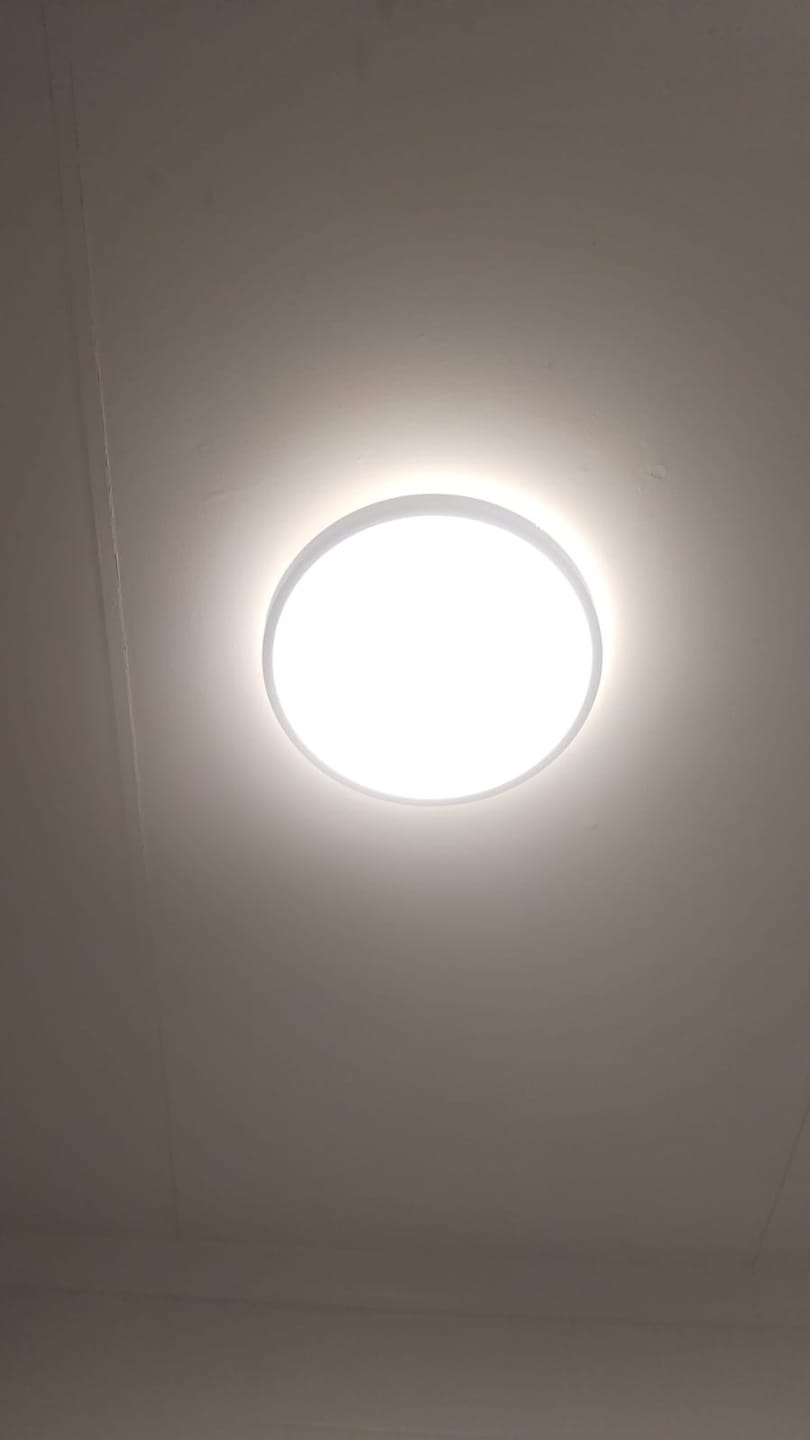Customer photo review of Burton Black | White Slim CCT LED Bathroom Ceiling Light 2 Sizes