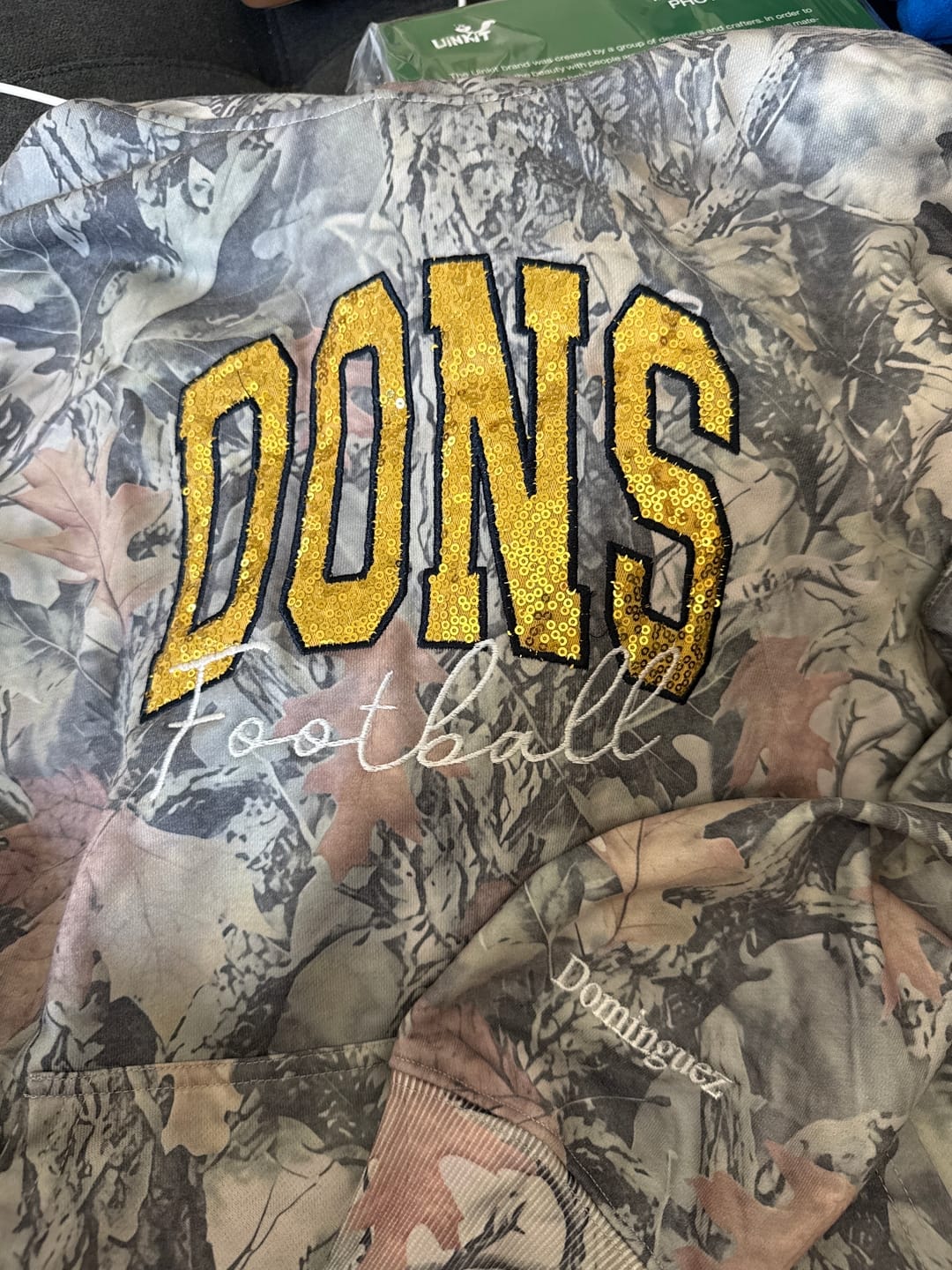 Customer photo review of Custom Sequin Name or Team Sweatshirt – Personalized Glitter Letters, Vintage Wash Style | Gifts for Sports Mom