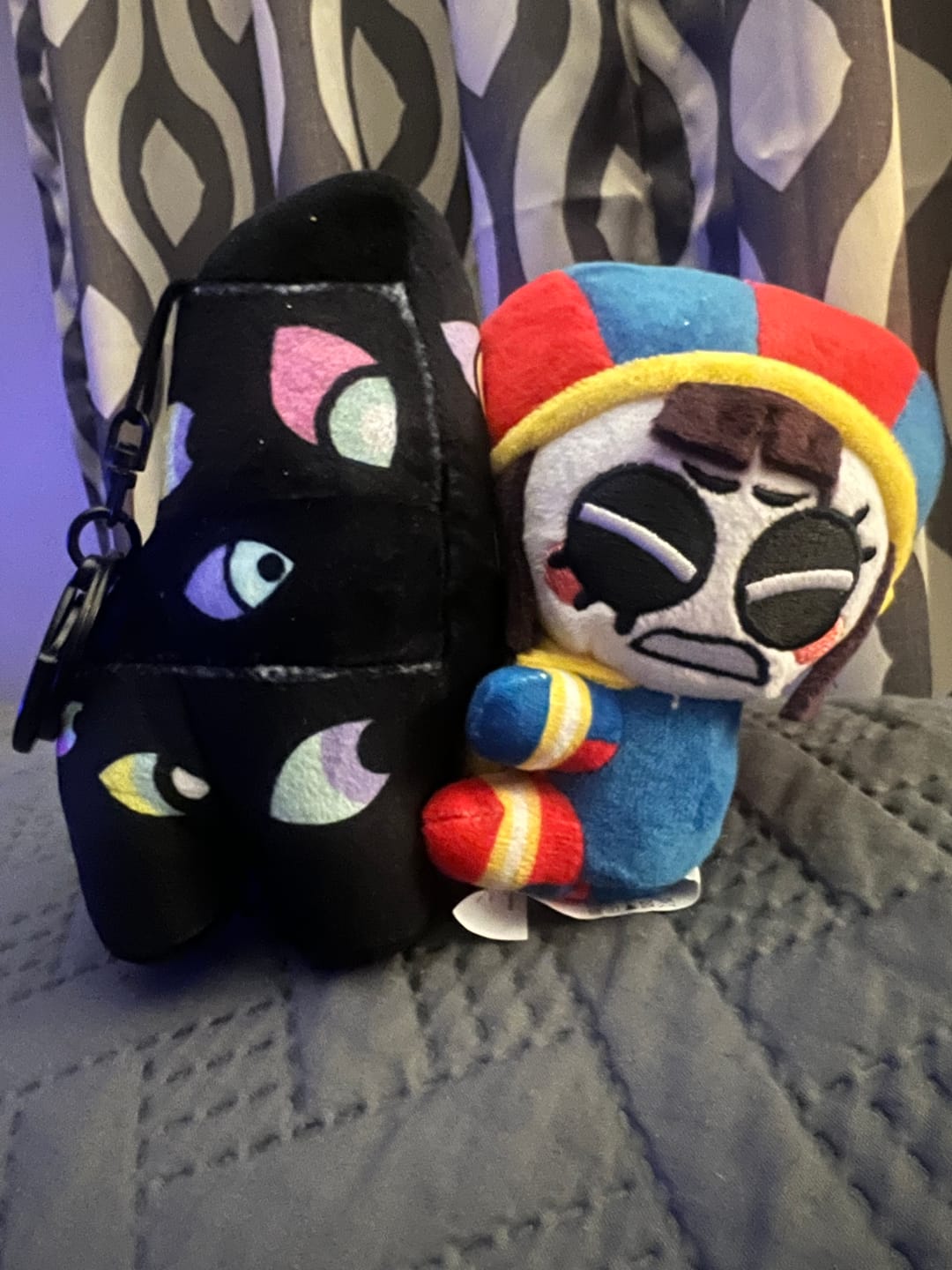 Customer photo review of Pomni & Abstraction Magnetic Plush Keychains