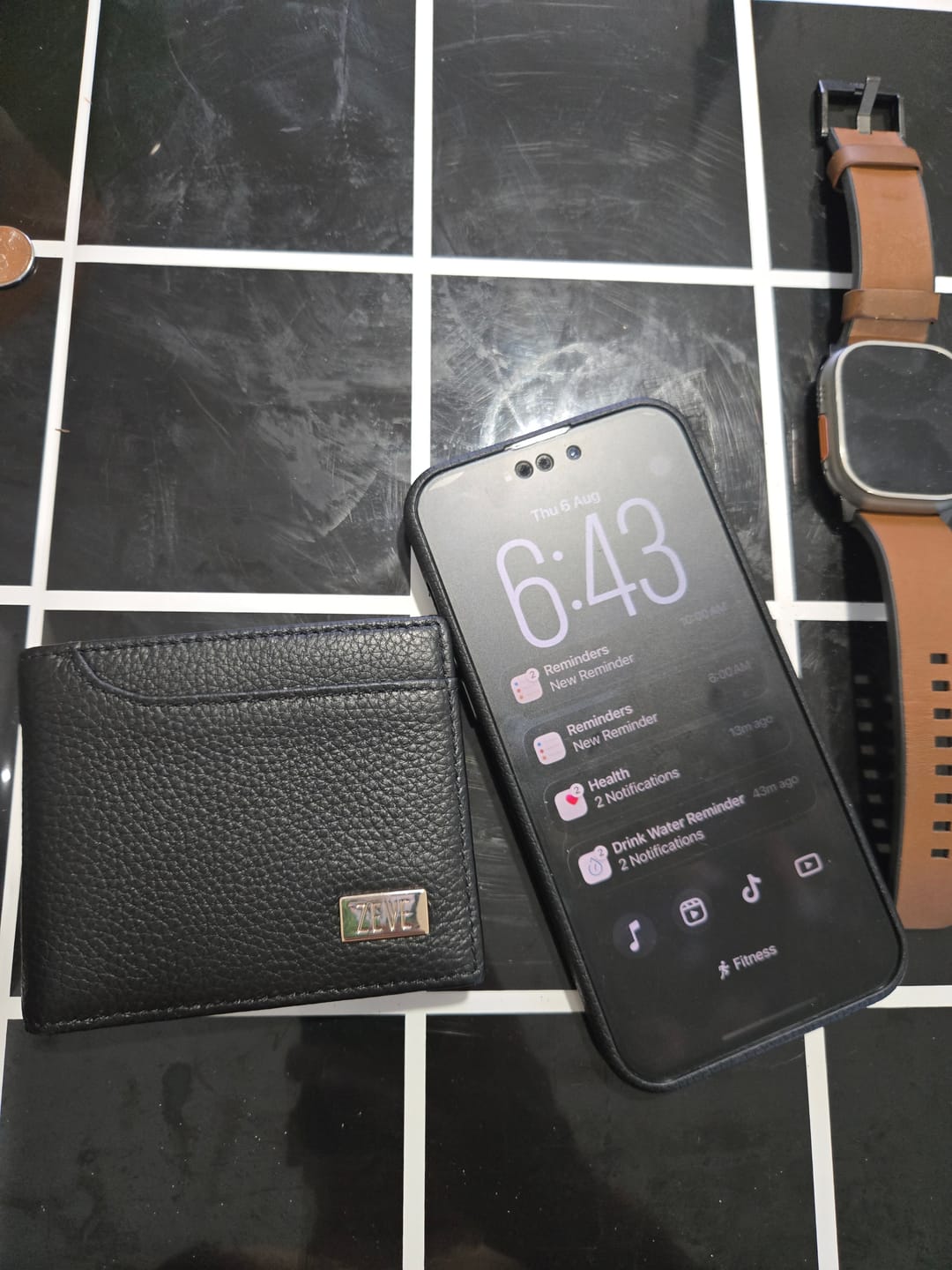 Customer photo review of Zeve Slim Bifold Wallet -  Black Pebble Grain Leather