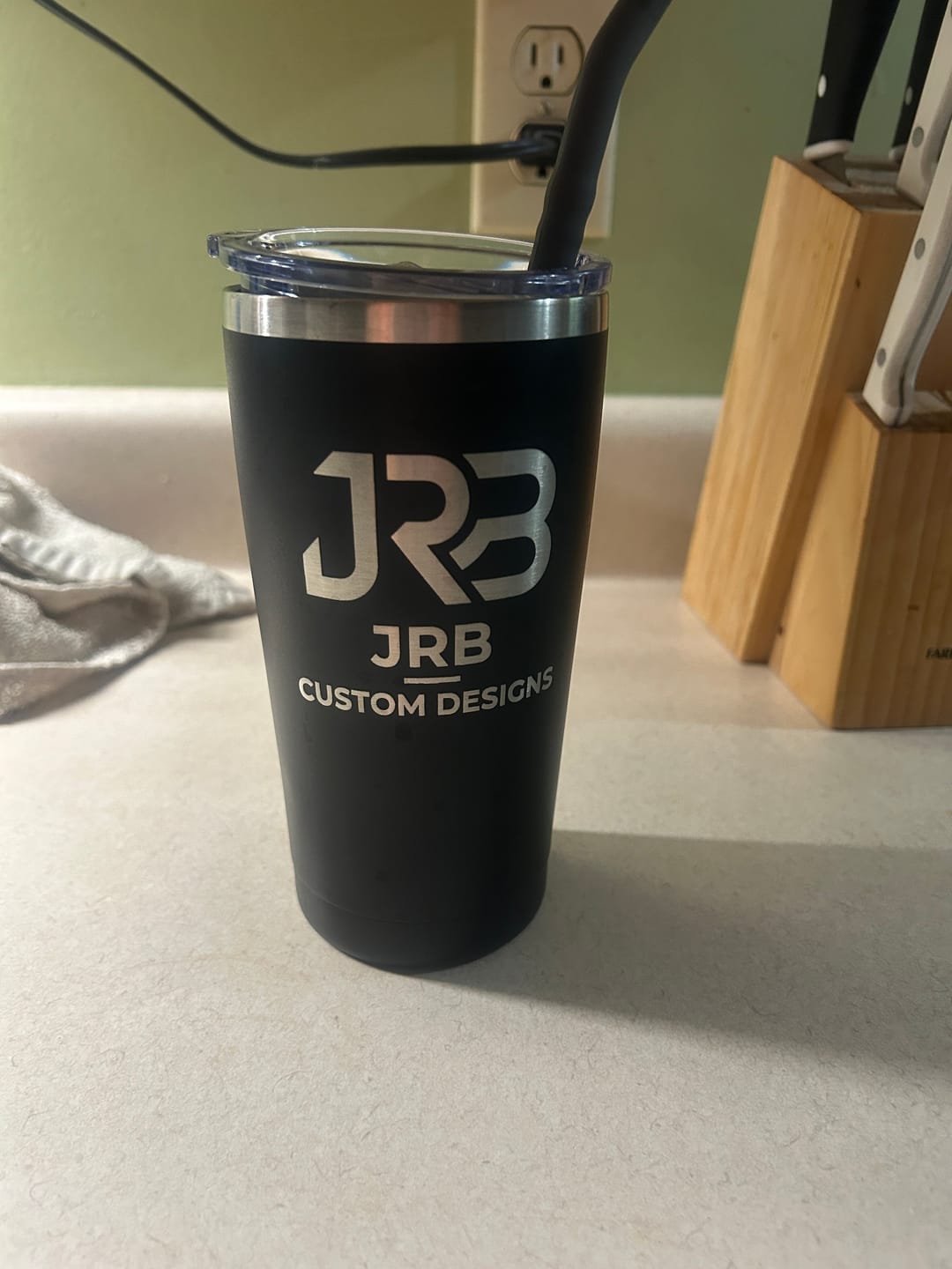 Customer photo review of $5 Sample - Custom 20 oz Tumbler with your Business Logo Engraved - Great Test Before Bulk Volume Order!