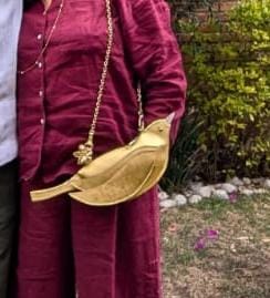 Customer photo review of CROSSBODY PAJARITO ORO AMARILLO