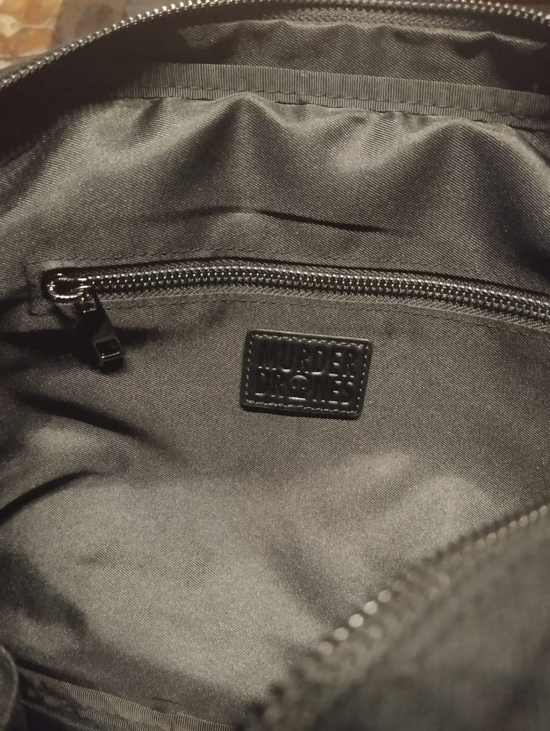 Customer photo review of Murder Drones Laptop Bag