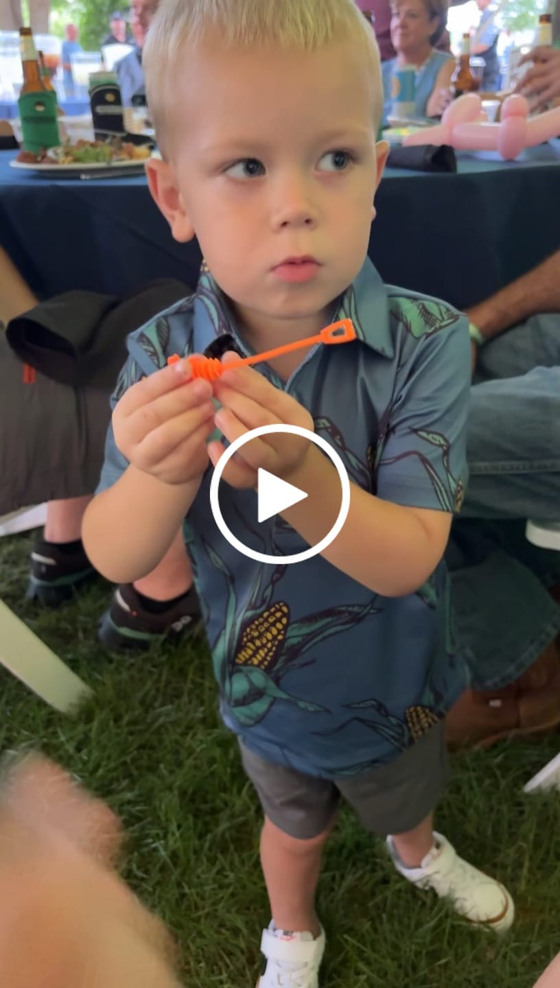 Customer video review of Shuck Yeah Kid's Performance Polo in Blue