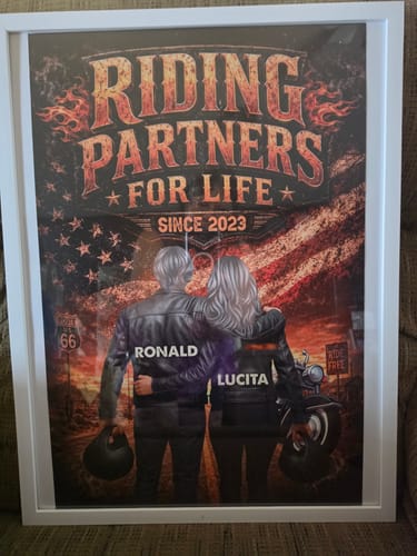 Customer's Bikers Couple Riding Partners for Life poster in a white frame, displaying two people and Route 66 branding.
