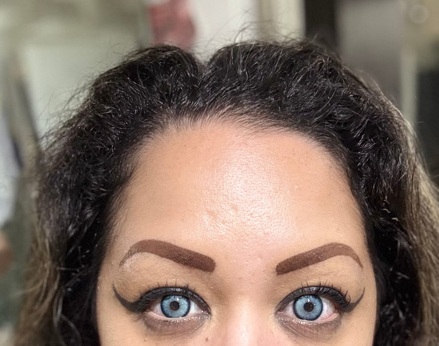 Customer photo review of Himalaya Blue Prescription Colored Contact Lenses