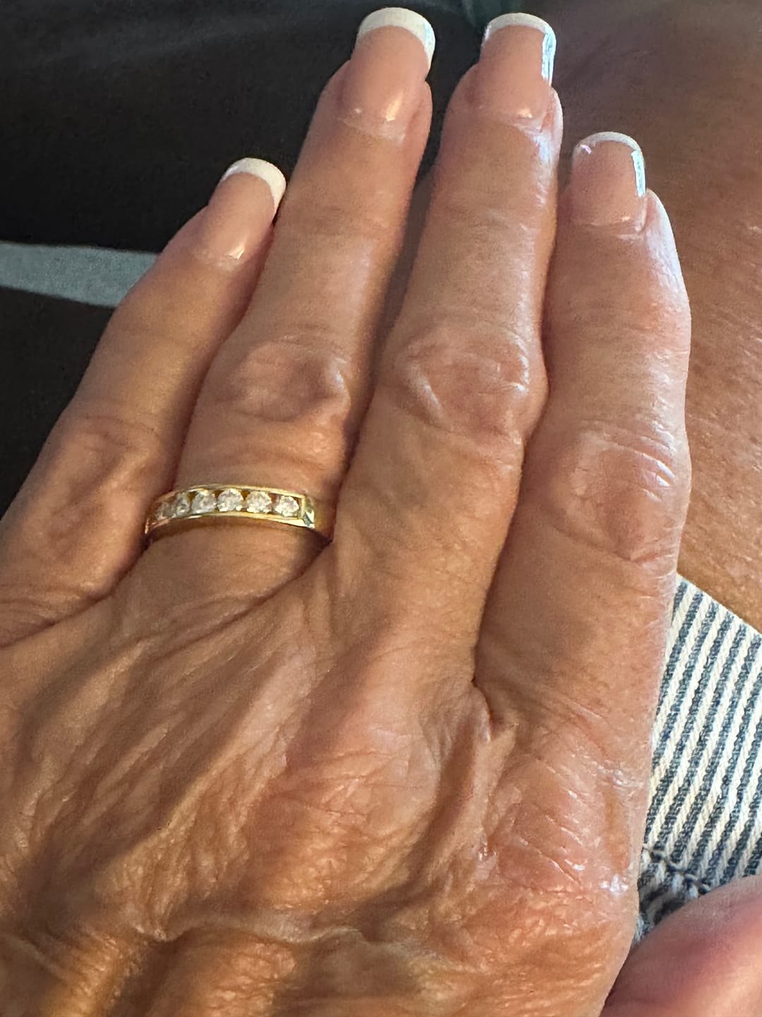 Customer photo review of Channel Set Moissanite Half Eternity Wedding Band Ring In Sterling Silver