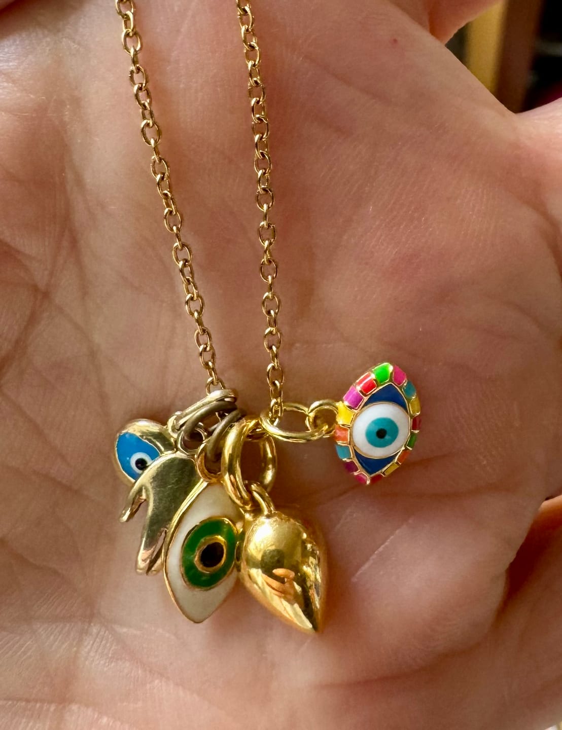 Customer photo review of (Not So) Evil Eye Charm | Enamel 18k Gold-plated Sterling Silver