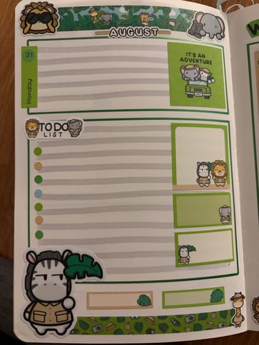 Reviewer's Ultimate Subscription journal page with safari themed stickers, animal characters, and a to-do list.