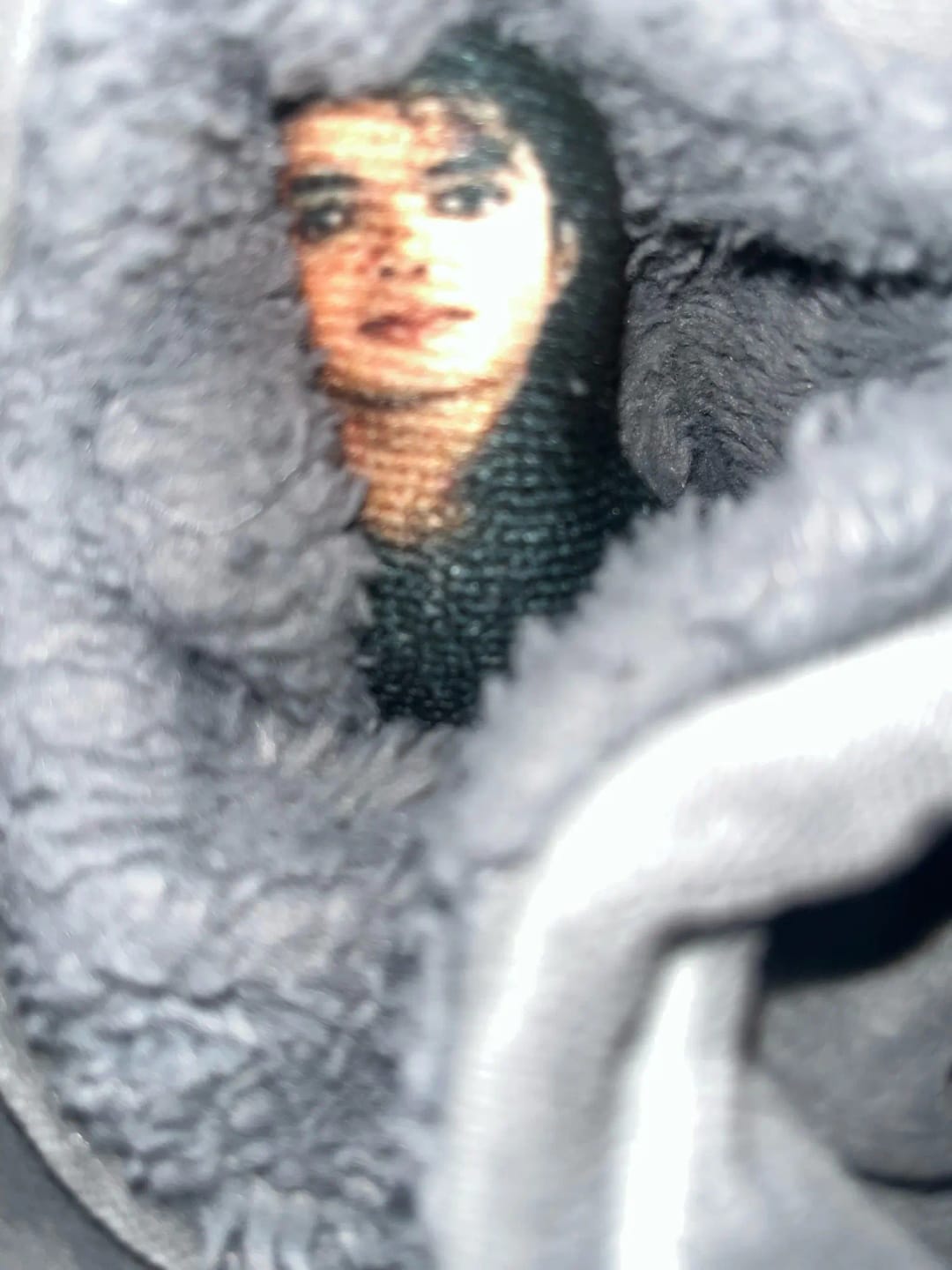 Customer photo review of Mini Michael Doll Plush