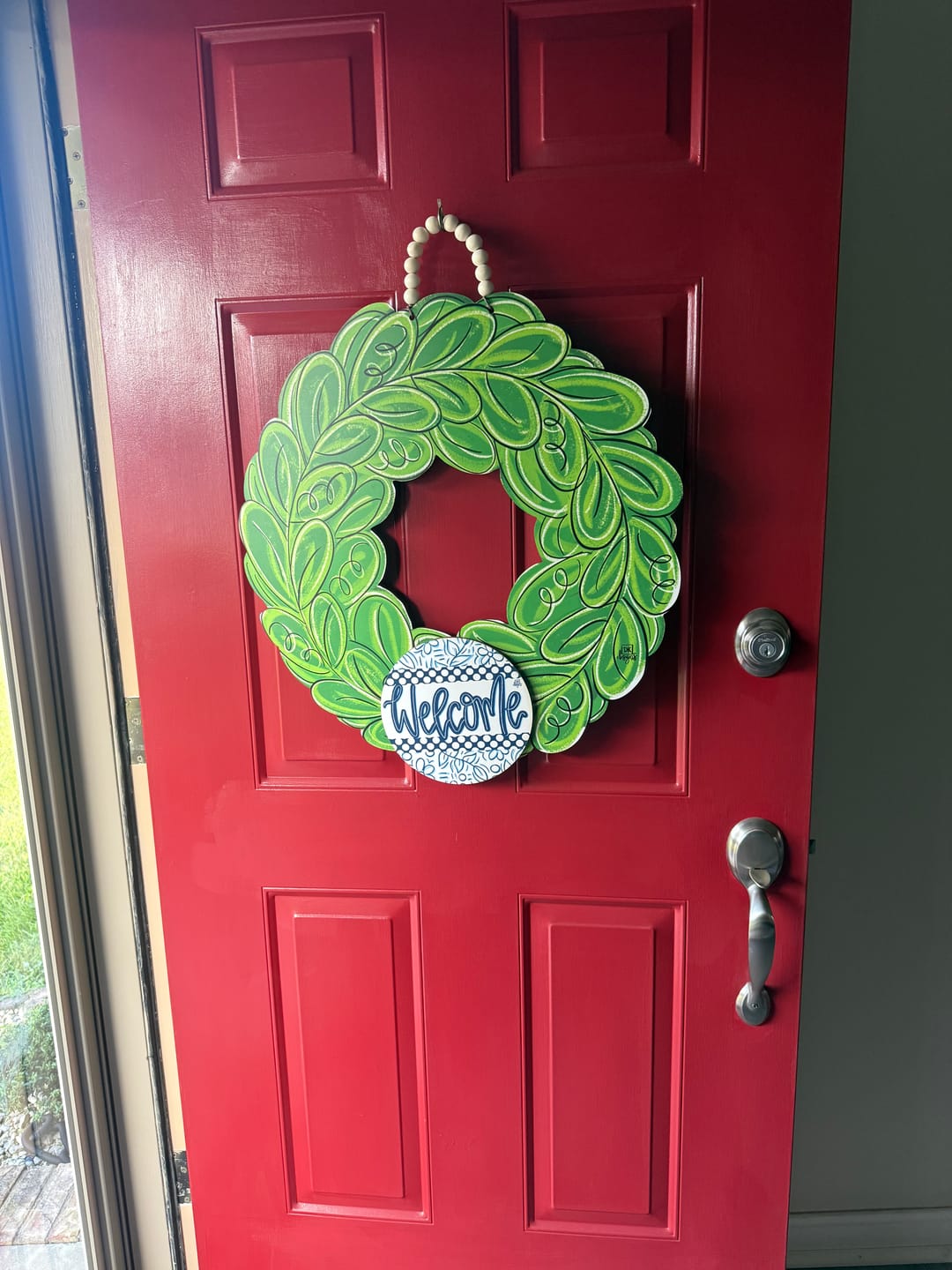 Customer photo review of Wreath Door Hanger w/ blue welcome mini