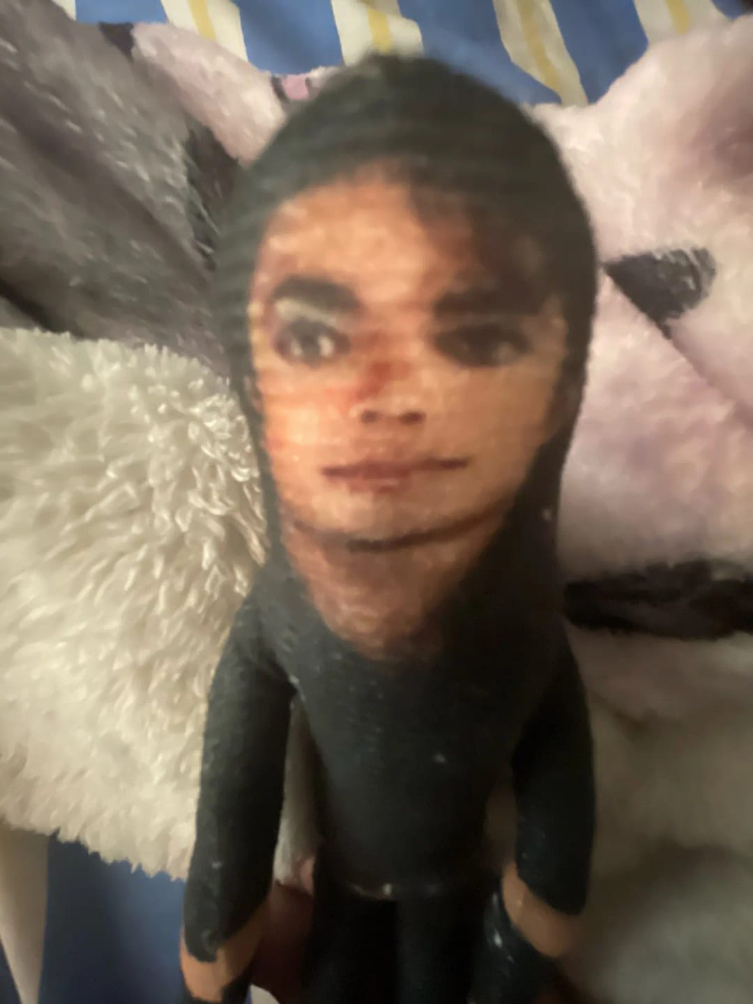 Customer photo review of Mini Michael Doll Plush