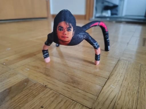 Customer photo review of Mini Michael Doll Plush