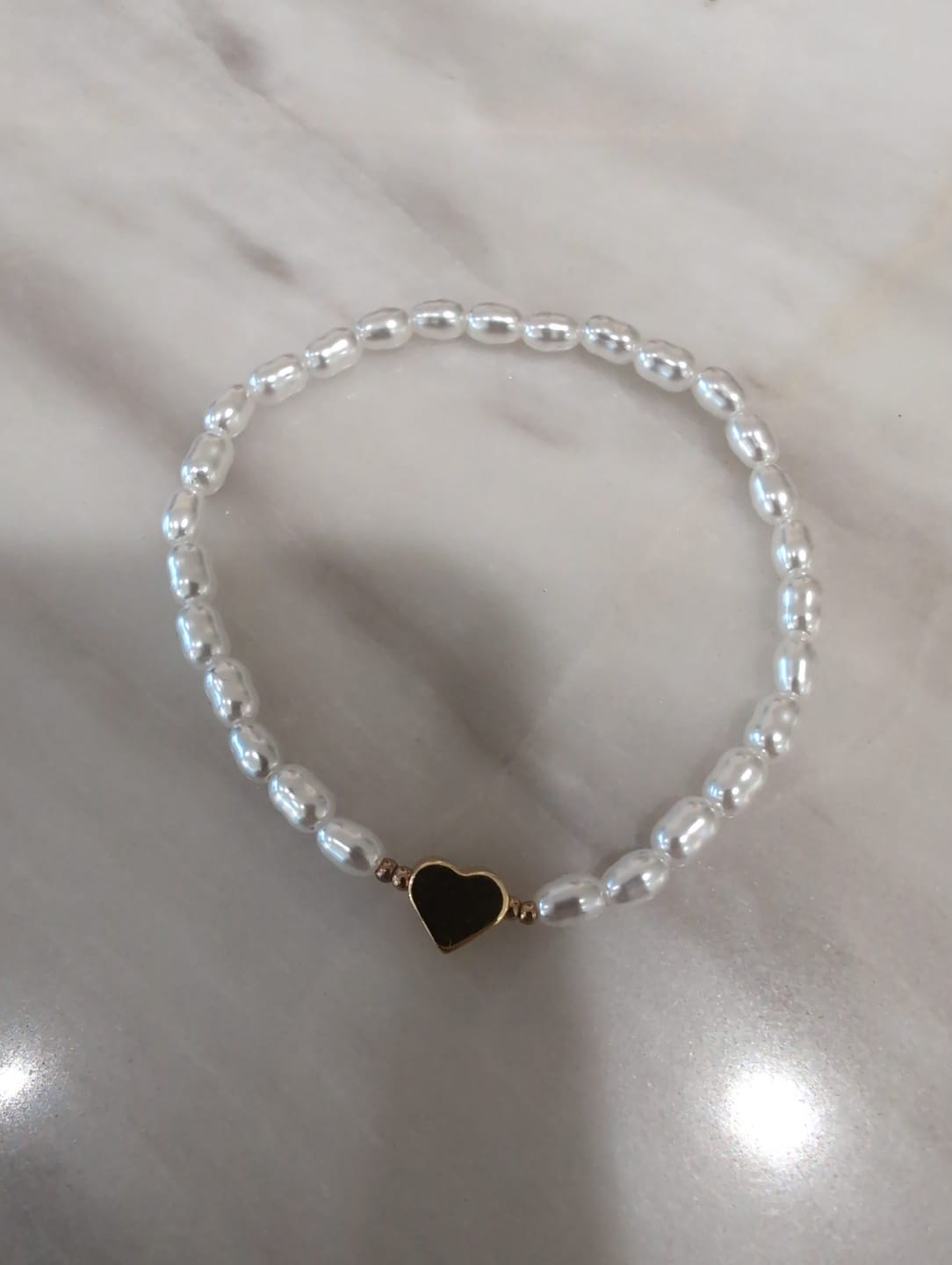 Customer photo review of Pulsera Bolitas Dorado y Plateado