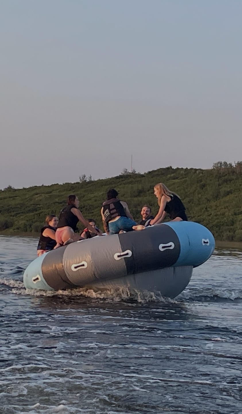 Customer photo review of Flying Spinning Inflatable Towable Tube Blow Up UFO Spinning Top Water Rotating Inflatable Floating Boat
