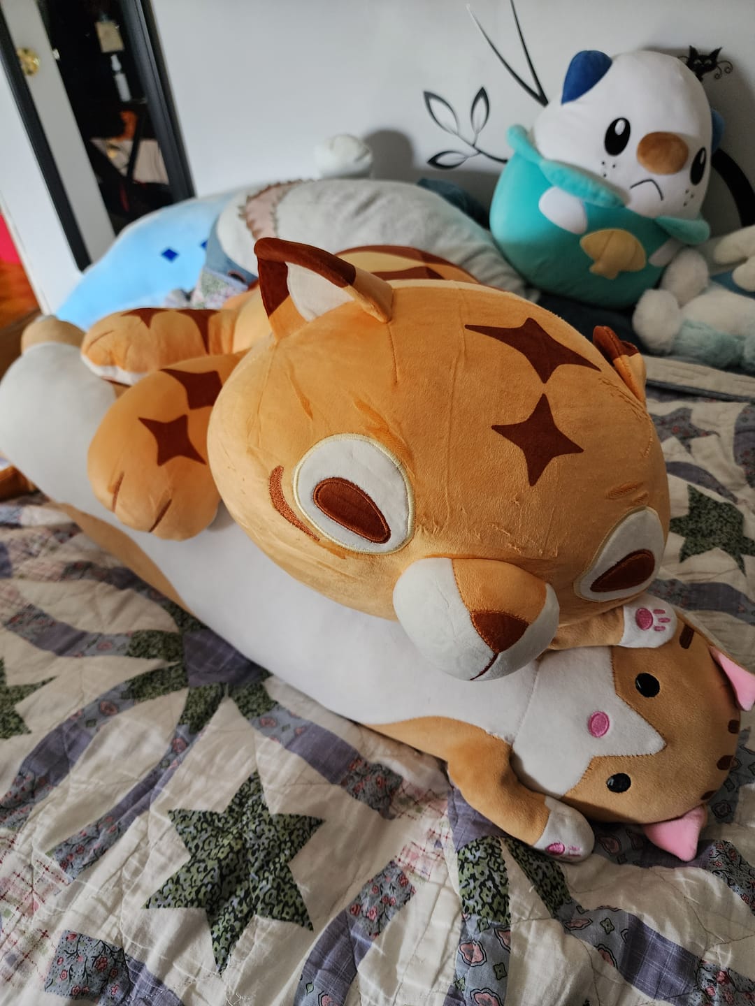 Customer photo review of GIANT 4LB Weighted Multi-Tiger Plush