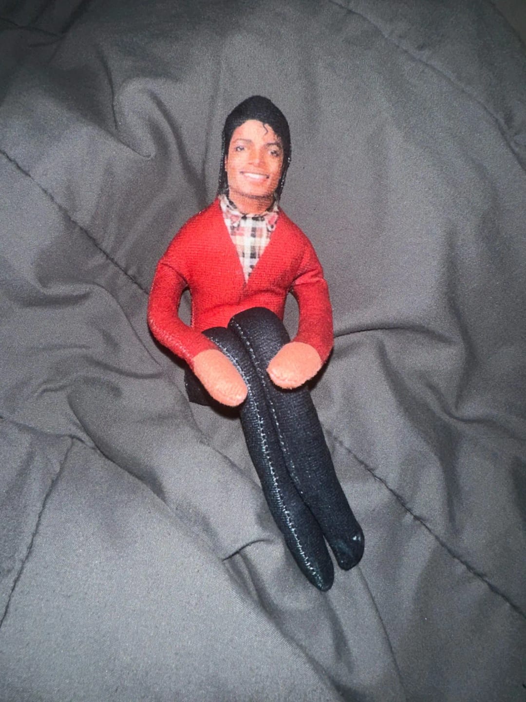 Customer photo review of Mini Michael Doll Plush