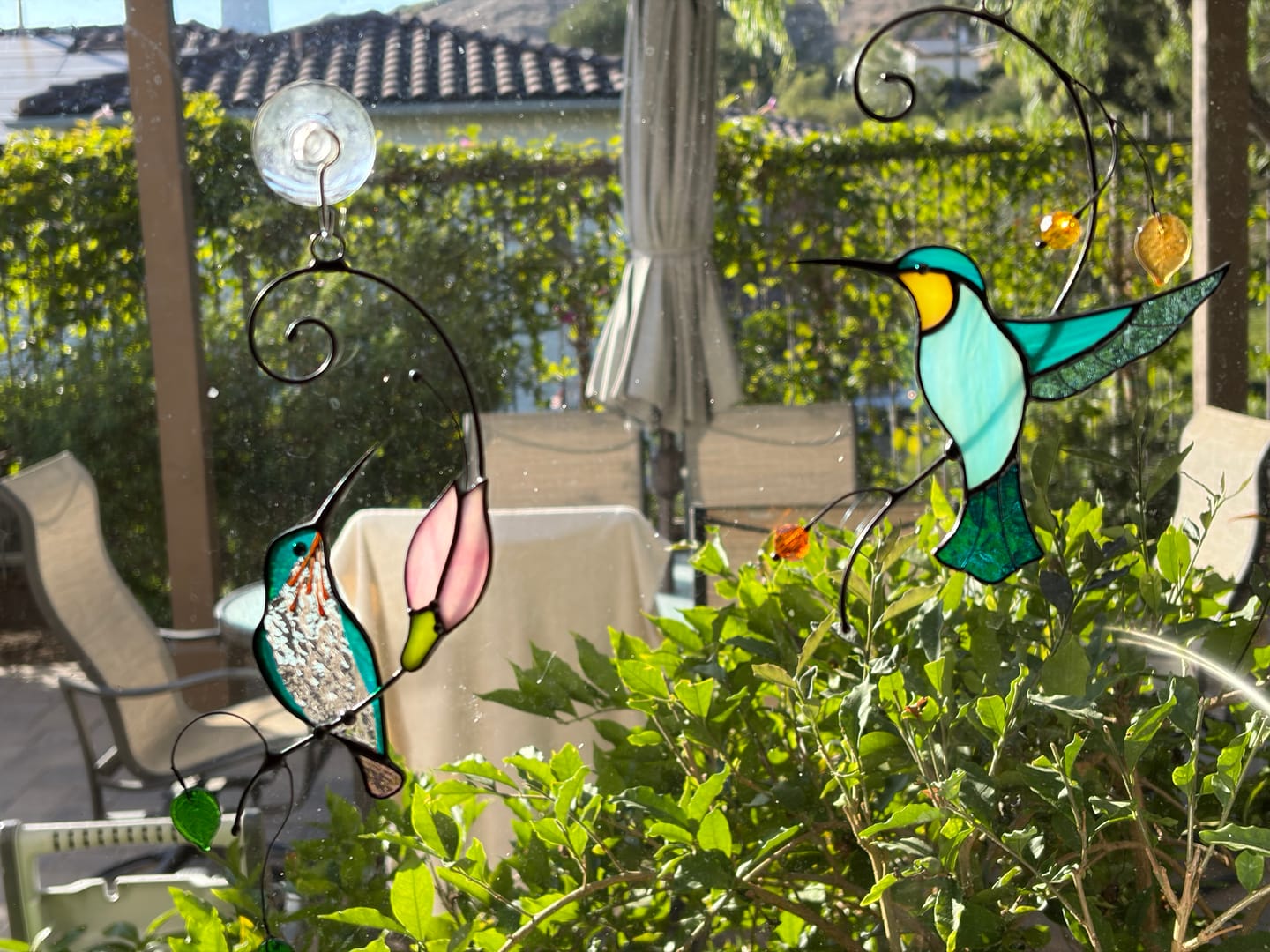 Customer photo review of Turquiose hummingbird ornament - Stained glass window hanging