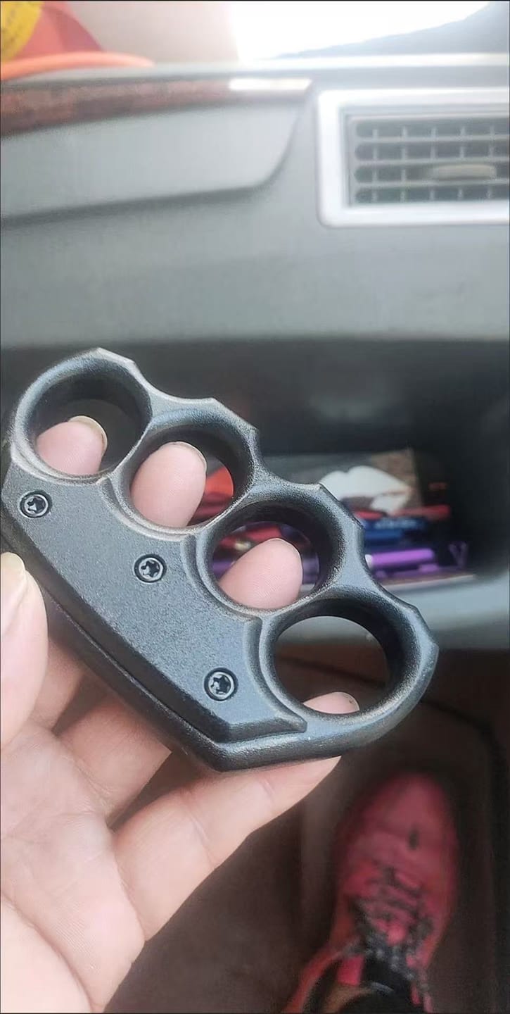Customer photo review of Stainless Steel Knuckle Duster Paperweight