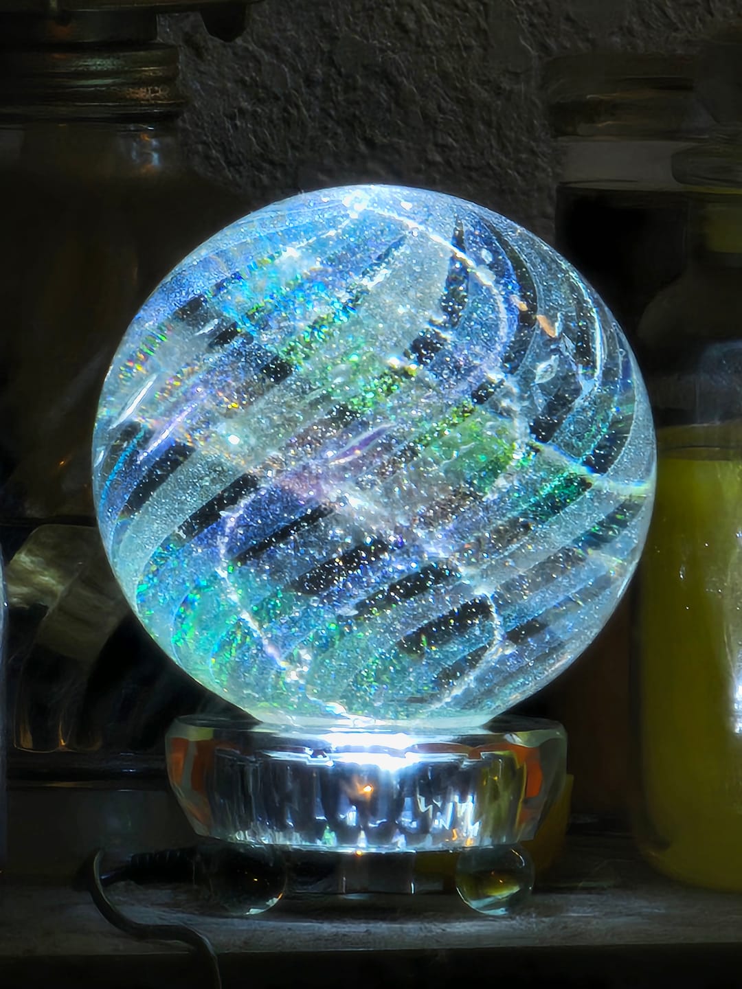 Customer photo review of Illuminated Dichroic Rainbow Orb with Cremains