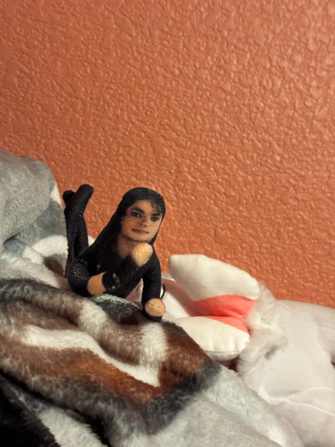 Customer photo review of Mini Michael Doll Plush