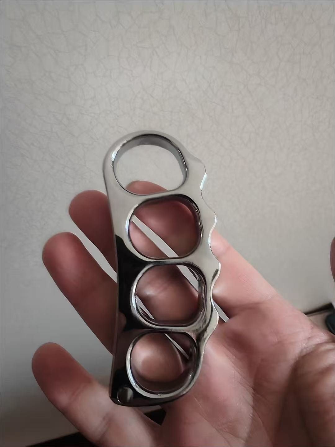 Customer photo review of Solid 304 Stainless Steel Brass Knuckles EDC Gadgets