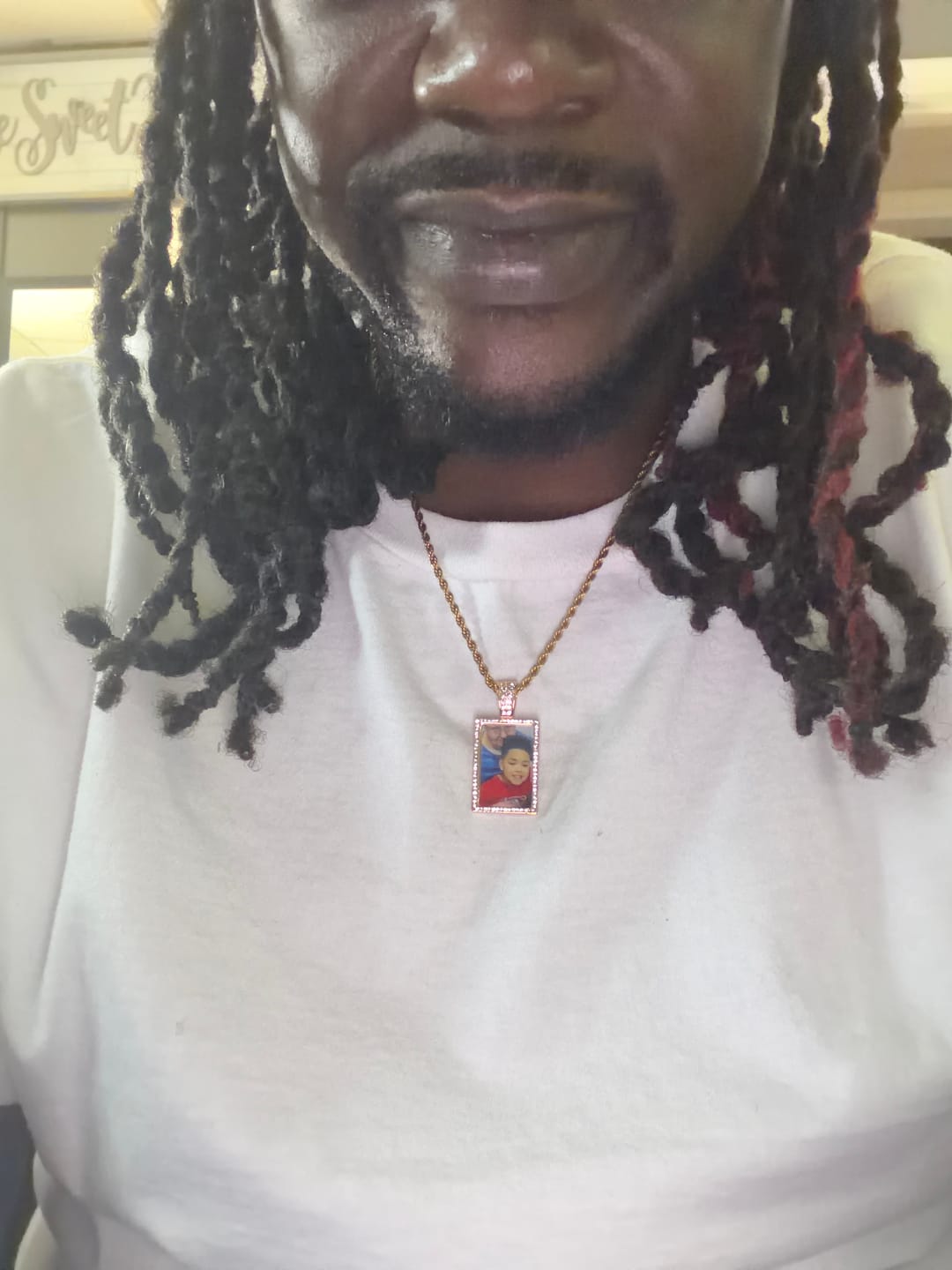 Customer photo review of Personalized Diamond Studded Colorful Rectangle Photo Necklace