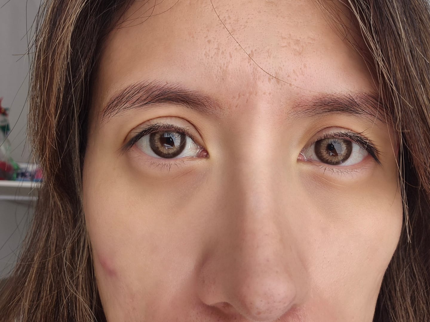 Customer photo review of Ruri Brown Prescription Colored Contact Lenses