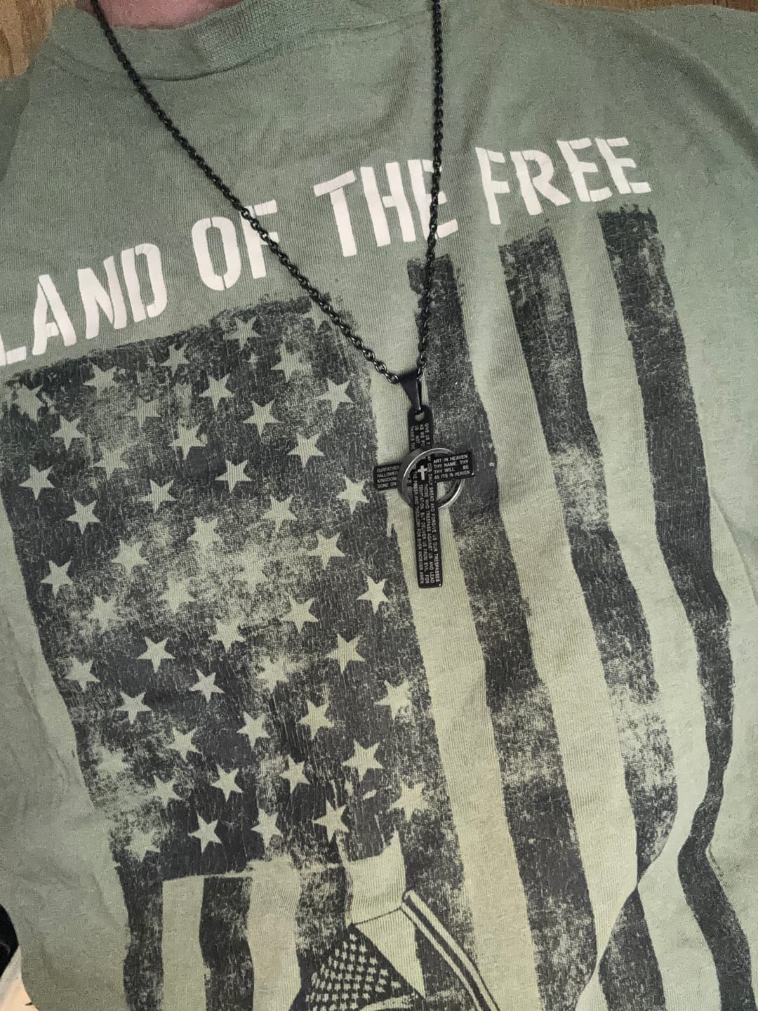 Customer photo review of FREE Today: Lord’s Prayer Engraved Cross Pendant Necklace with Spinning Ring