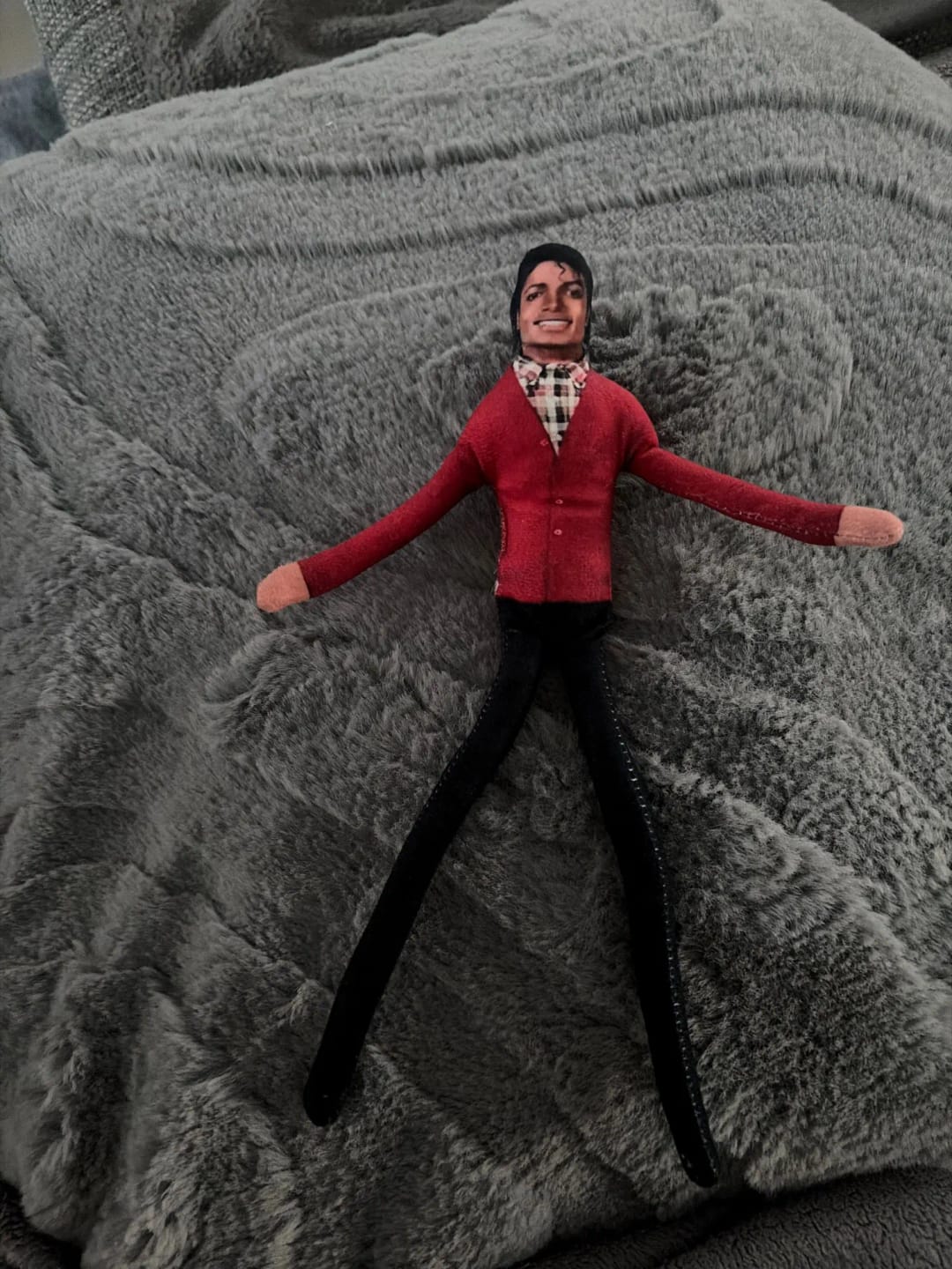 Customer photo review of Mini Michael Doll Plush