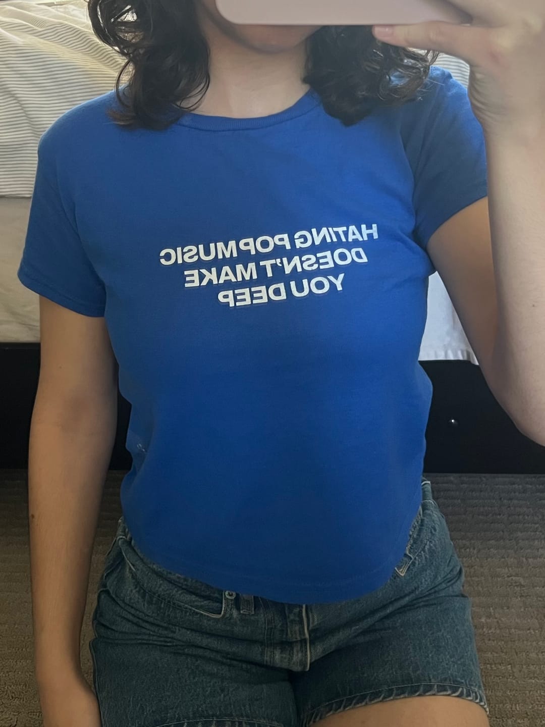 Customer photo review of Hating Pop Music Doesn't Make You Deep Baby Tee