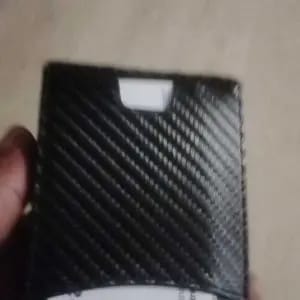 Customer photo review of VaultGuard™ Leather RFID Pop-Up Wallet