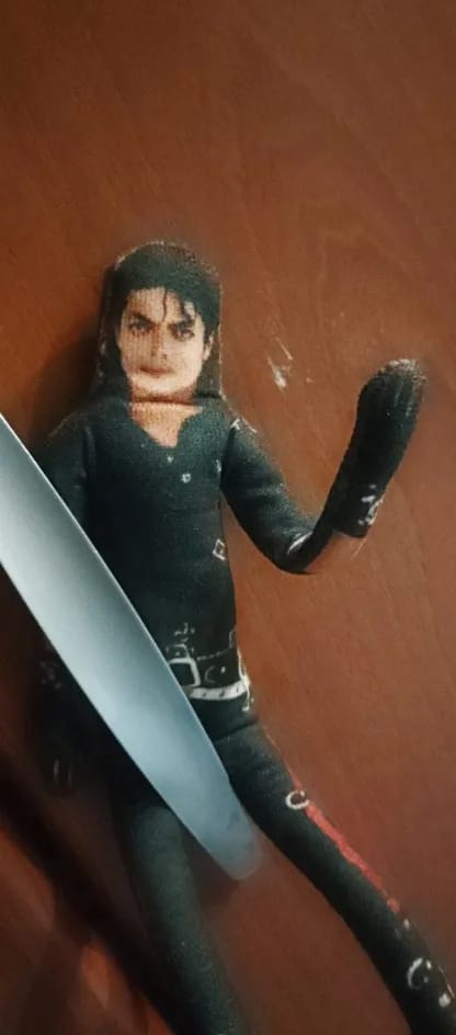 Customer photo review of Mini Michael Doll Plush