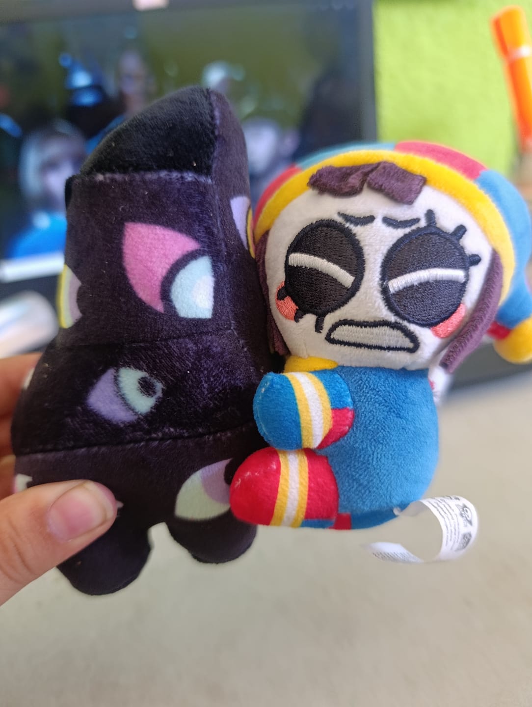 Customer photo review of Pomni & Abstraction Magnetic Plush Keychains