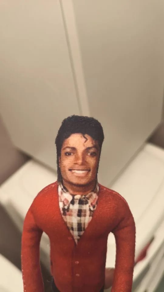 Customer photo review of Mini Michael Doll Plush